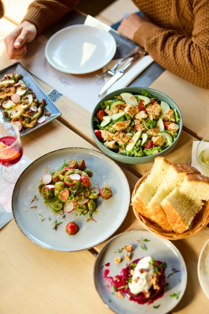 Plates of various foods on the table